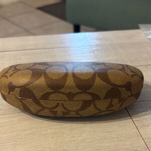 Signature Coach Monogram Hard Sunglasses Case in Brown